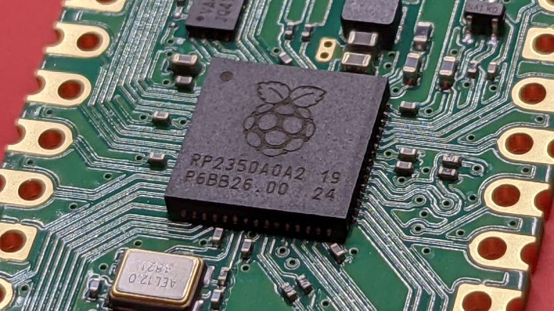 Macro view of high-efficiency on-device AI microcontroller and audio DSP architecture on circuit board